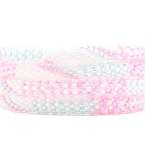 Sashka Co. handmade glass beaded friendship bracelet with pink, white, and light blue glass beads. Crafted in Nepal by skilled artisans.