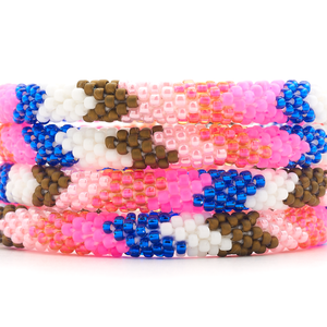 Sashka Co handmade beaded friendship bracelet with Pinks , Blue , White , Brown  glass beads. Crafted in Nepal by skilled artisans.
 
 