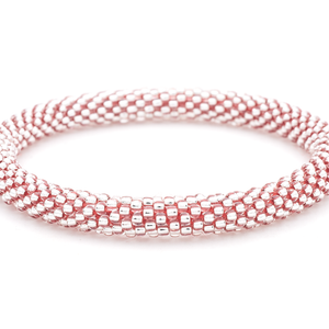 Sashka Co. handmade glass beaded friendship bracelet with red thread and clear glass beads. Crafted in Nepal by skilled artisans.