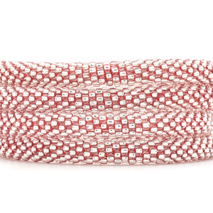 Sashka Co. handmade glass beaded friendship bracelet with red thread and clear glass beads. Crafted in Nepal by skilled artisans.