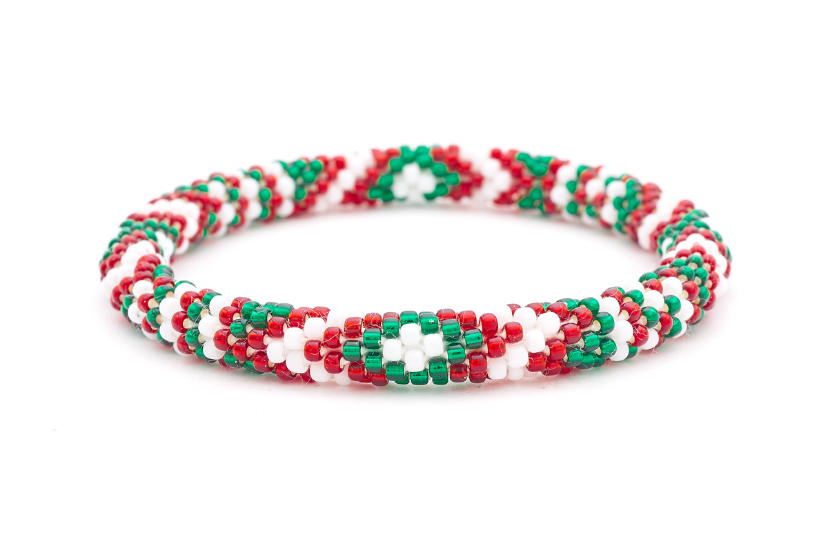 Sashka Co. handmade glass beaded friendship bracelet with red, white, and green glass beads in a festive holiday pattern. Crafted in Nepal by skilled artisans.