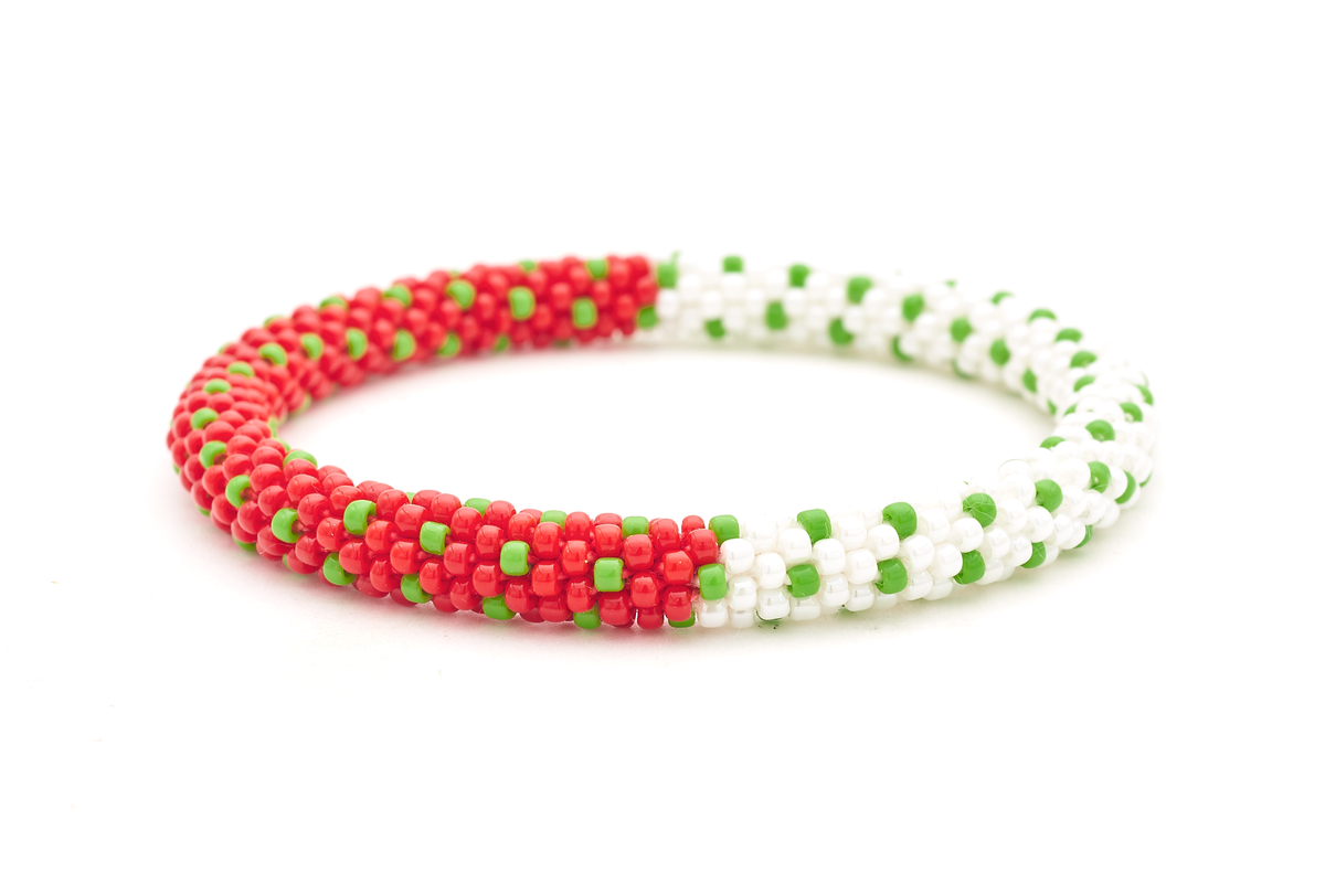 Sashka Co. handmade glass beaded friendship bracelet with red, white, and green glass beads in a half-and-half polka dot pattern. Crafted in Nepal by skilled artisans.