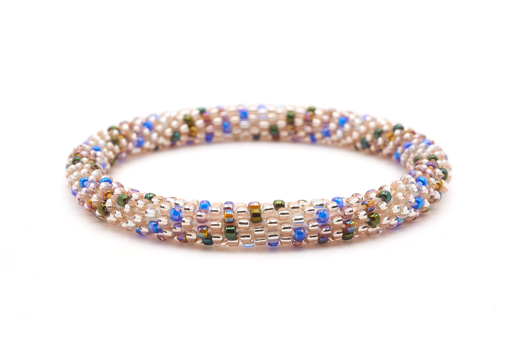 Sashka Co. handmade glass beaded friendship bracelet with rose gold and mixed iridescent glass beads in blue, green, purple, and brown in a polka dot spiral pattern. Crafted in Nepal by skilled artisans.