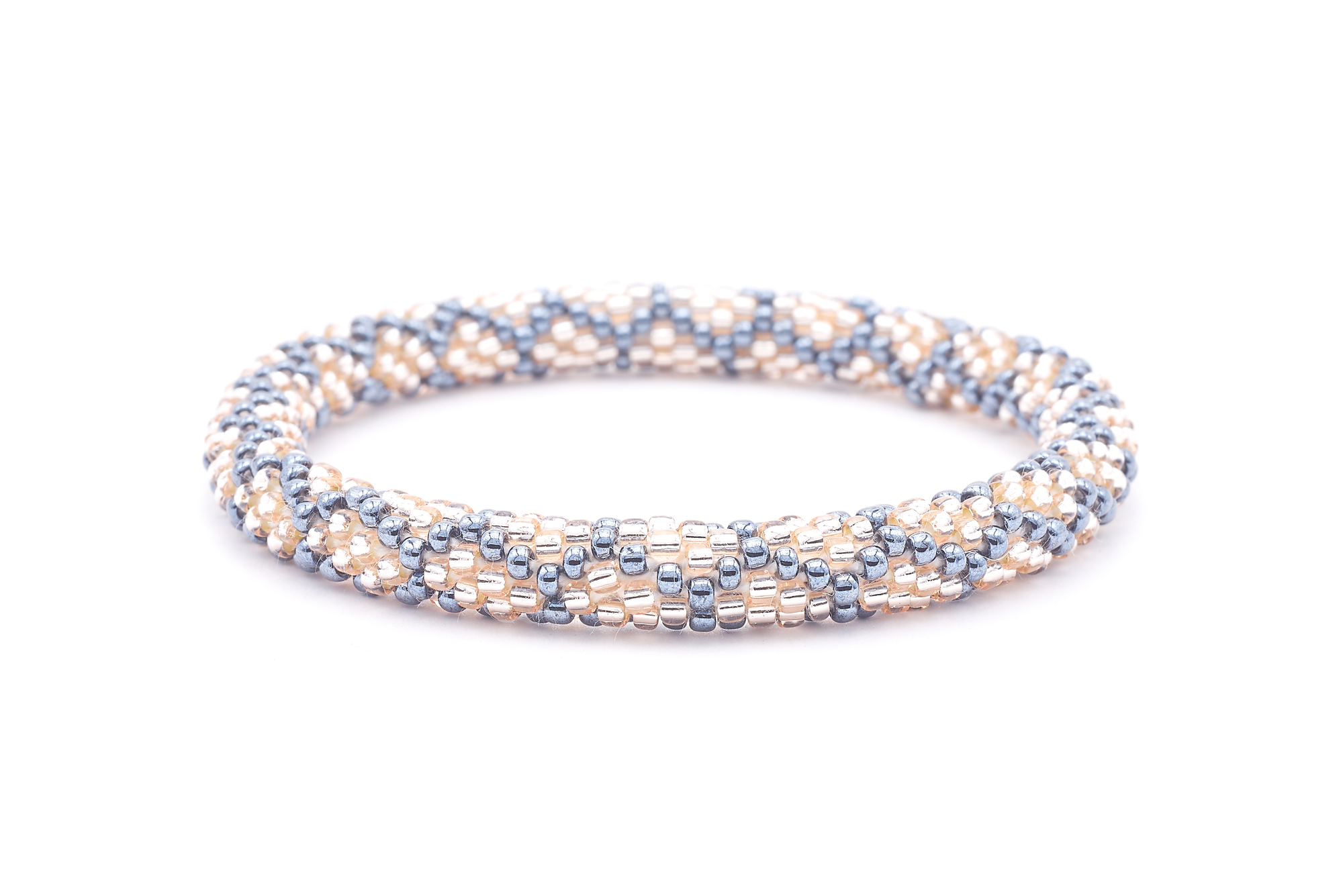 Sashka Co. handmade glass beaded friendship bracelet with rose gold and silver glass beads. Crafted in Nepal by skilled artisans.