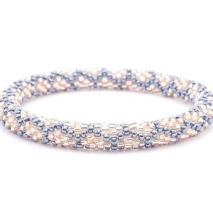 Sashka Co. handmade glass beaded friendship bracelet with rose gold and silver glass beads. Crafted in Nepal by skilled artisans.