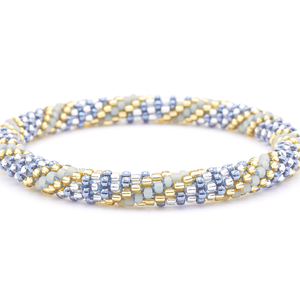 Sashka Co. handmade glass beaded friendship bracelet with silver, clear, champagne gold, and matte gray glass beads. Crafted in Nepal by skilled artisans.