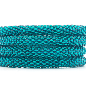 Sashka Co. handmade glass beaded friendship bracelet with teal glass beads in a solid pattern. Crafted in Nepal by skilled artisans.