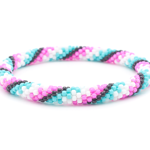 Sashka Co. handmade glass beaded friendship bracelet with turquoise, black, white, and pink glass beads. Crafted in Nepal by skilled artisans.