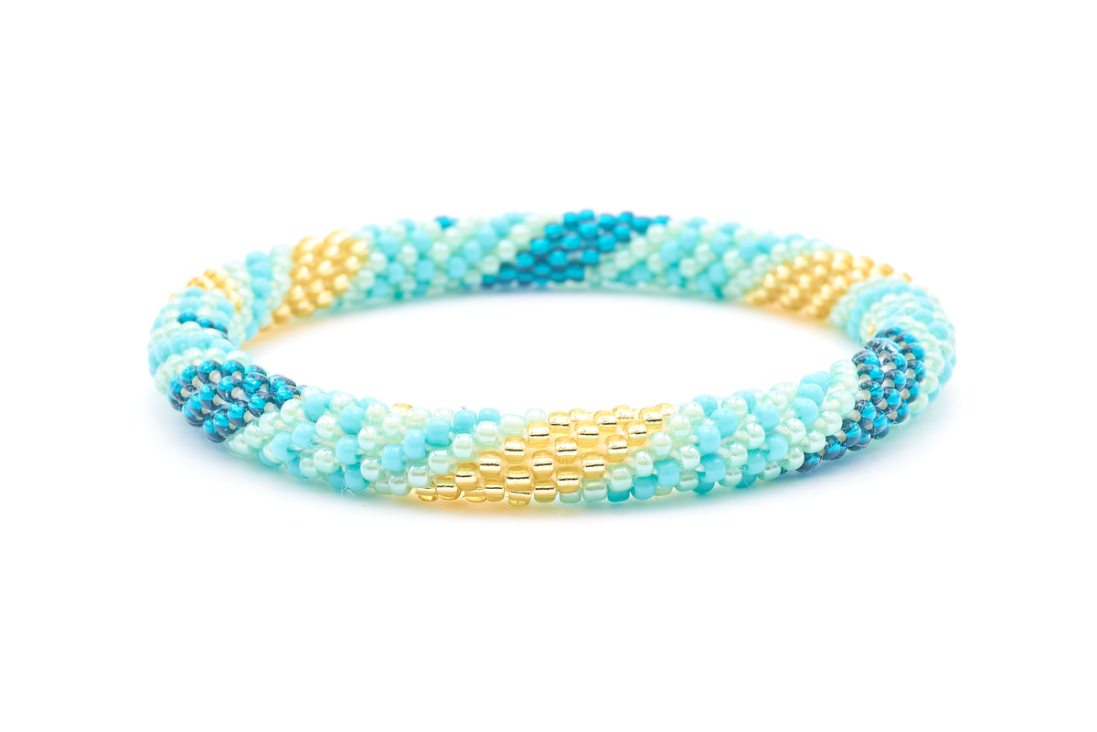 Sashka Co. handmade glass beaded friendship bracelet with turquoise, teal, mint, and champagne gold glass beads. Crafted in Nepal by skilled artisans.
