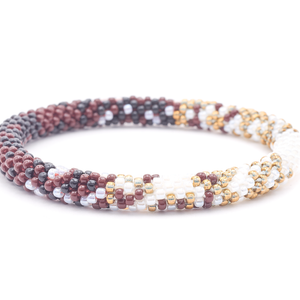 Sashka Co. handmade glass beaded friendship bracelet with white, black, and brown glass beads. Crafted in Nepal by skilled artisans.