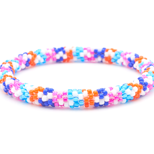 Sashka Co. handmade glass beaded friendship bracelet with white, blue, orange, and pink glass beads. Crafted in Nepal by skilled artisans.