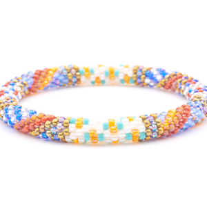 Sashka Co. handmade glass beaded friendship bracelet with white, brick red, bronze, turquoise, blue, orange, purple, iridescent, and clear glass beads. Crafted in Nepal by skilled artisans.