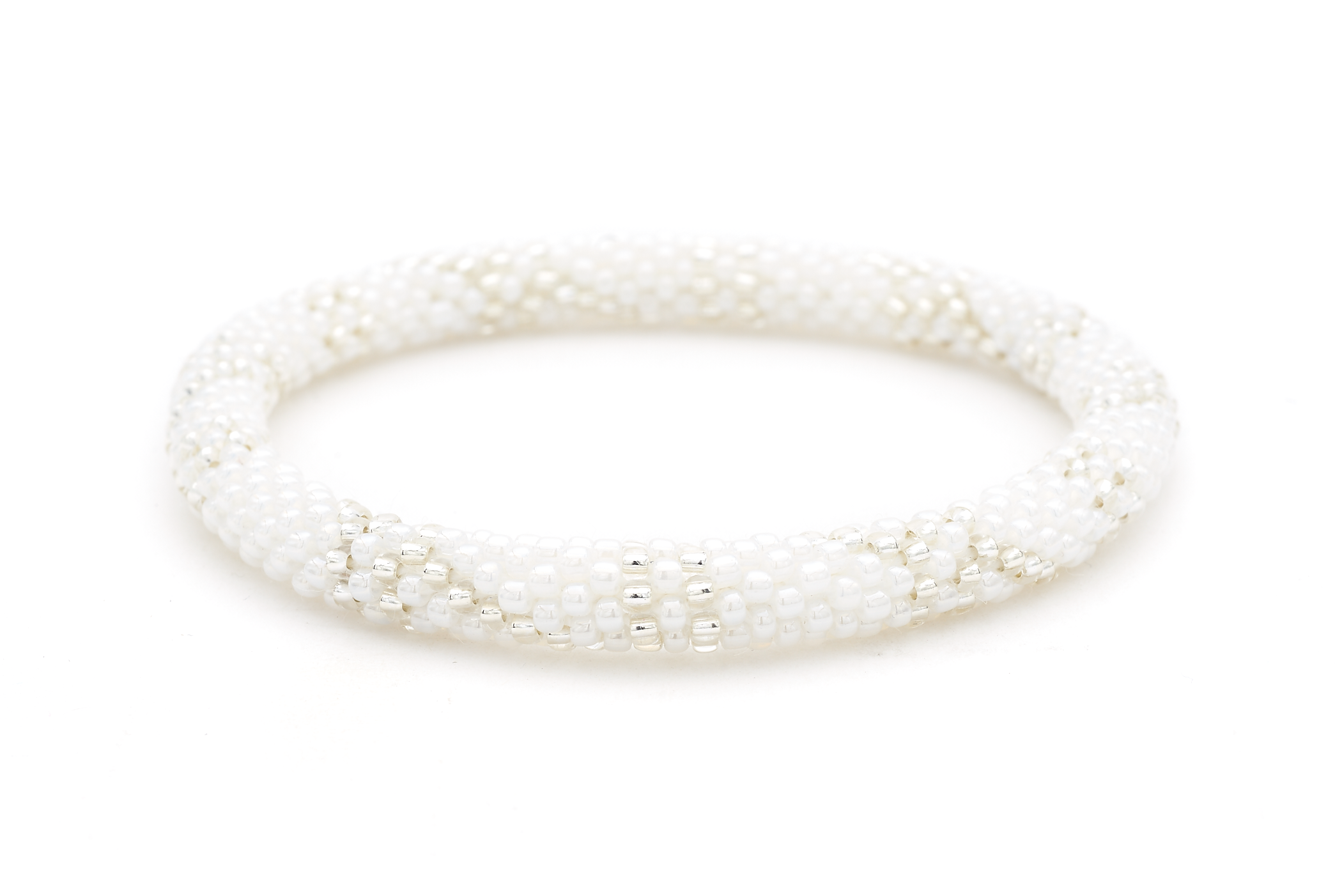 Sashka Co. handmade glass beaded friendship bracelet with white and clear glass beads in a line spiral pattern. Crafted in Nepal by skilled artisans.