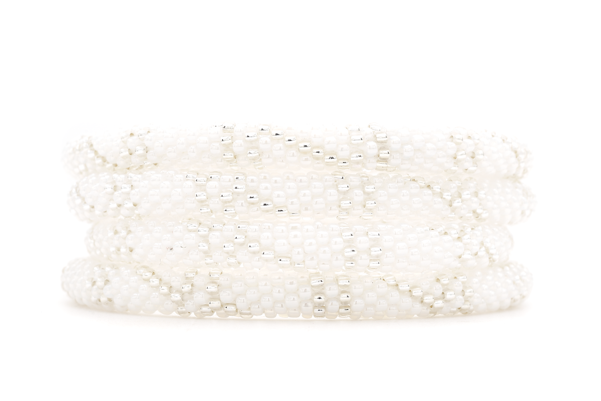Sashka Co. handmade glass beaded friendship bracelet with white and clear glass beads in a line spiral pattern. Crafted in Nepal by skilled artisans.