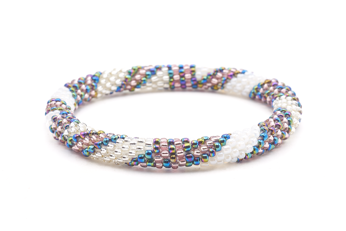 Handmade beaded friendship bracelet with white, clear, purple, and iridescent glass beads. Crafted by artisans in Nepal for Sashka Co.