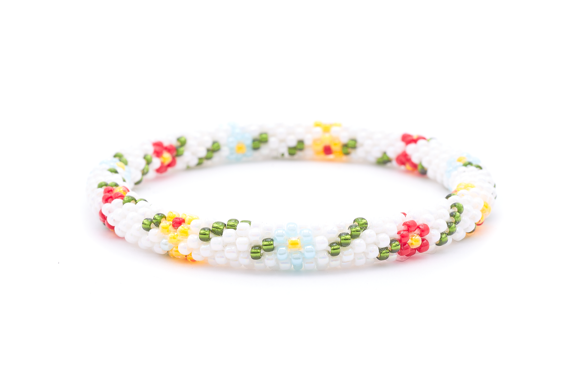 Sashka Co. handmade glass beaded friendship bracelet with white, green, red, blue, and orangish yellow glass beads. Crafted in Nepal by skilled artisans.