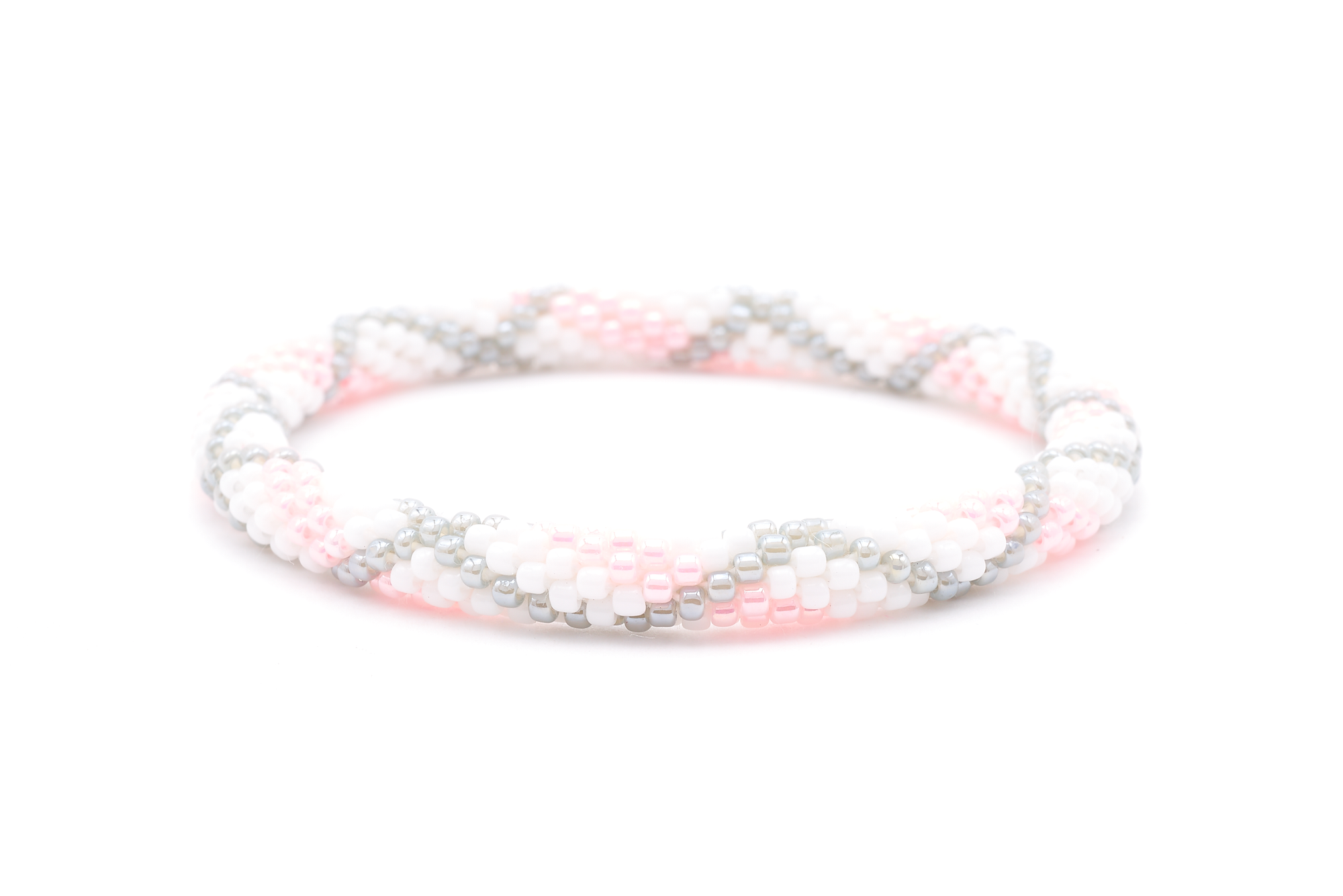 Sashka Co. handmade glass beaded friendship bracelet with white, pink, and gray glass beads. Crafted in Nepal by skilled artisans.