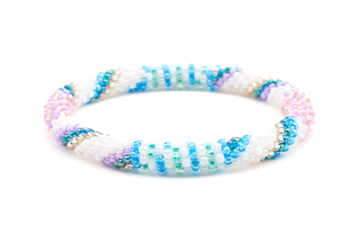 Sashka Co handmade beaded friendship bracelet with white, pink, purple, blue, rose gold, and teal glass beads. Crafted in Nepal by skilled artisans.