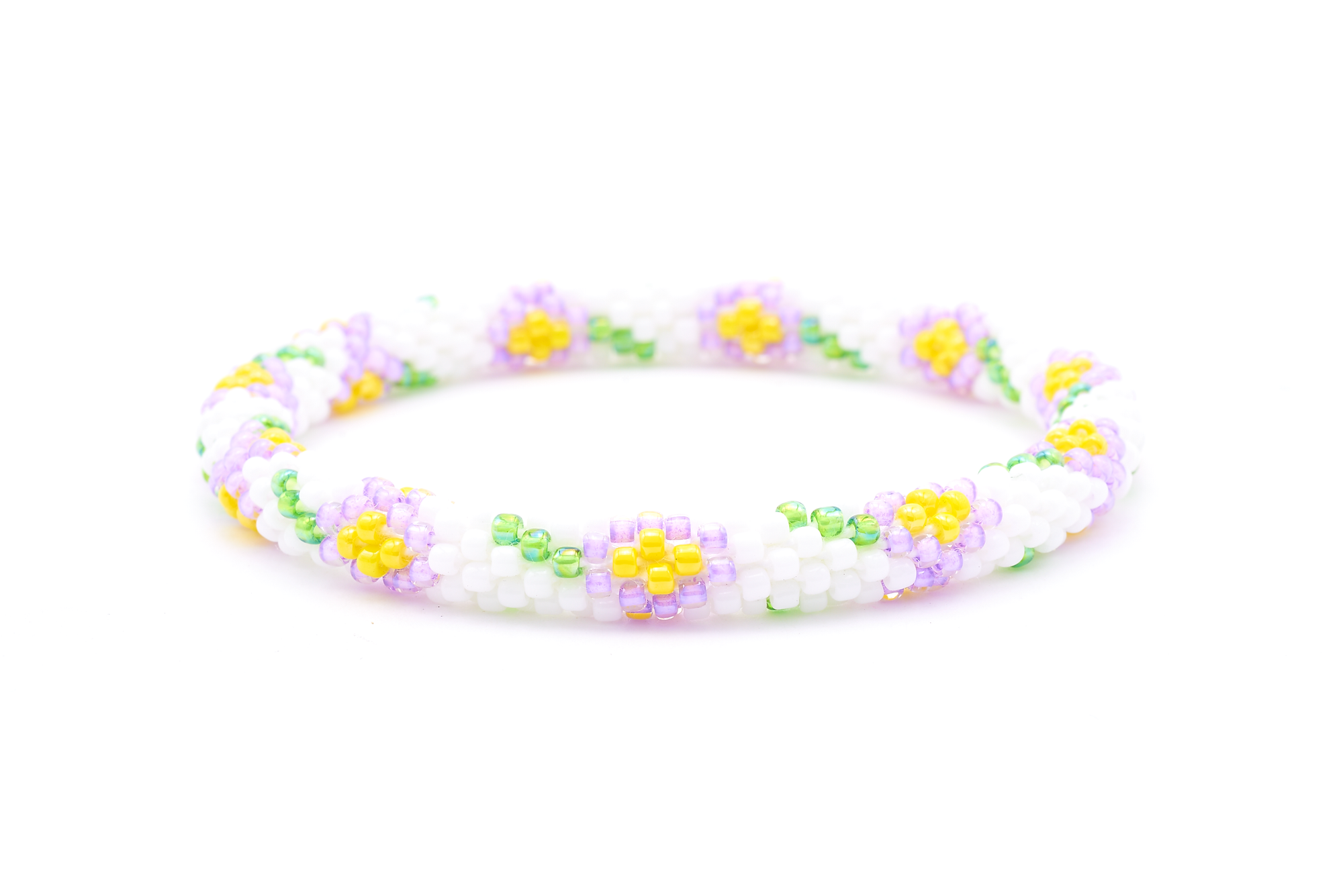 Sashka Co. handmade glass beaded friendship bracelet with white, purple, green, and yellow glass beads. Crafted in Nepal by skilled artisans.