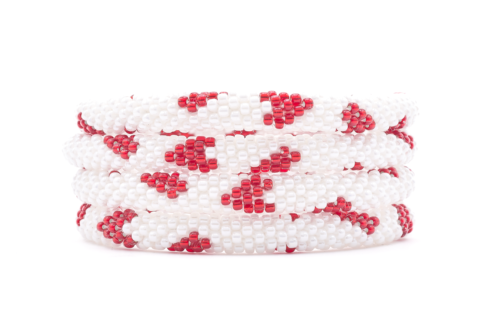 Sashka Co. handmade glass beaded friendship bracelet with white and red glass beads in a hearts pattern. Crafted in Nepal by skilled artisans.