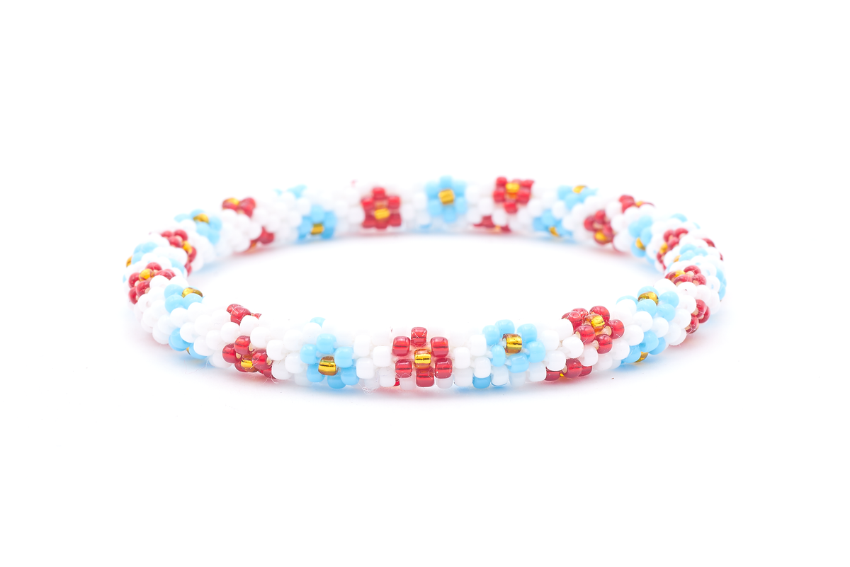Sashka Co. handmade glass beaded friendship bracelet with white, red, light blue, and gold glass beads. Crafted in Nepal by skilled artisans.