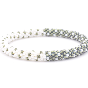 Sashka Co. handmade glass beaded friendship bracelet with white and silver glass beads. Crafted in Nepal by skilled artisans.