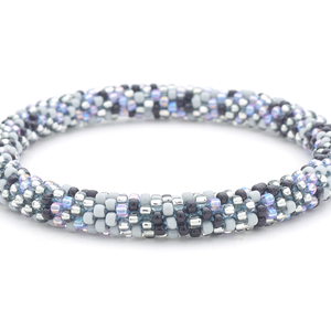 Sashka Co handmade beaded friendship bracelet with black, gray, clear, and iridescent light purple confetti pattern. Crafted in Nepal.

