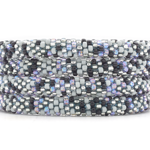 Sashka Co handmade beaded friendship bracelet with black, gray, clear, and iridescent light purple confetti pattern. Crafted in Nepal.


