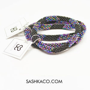 Sashka Co handmade beaded friendship bracelet with black and iridescent mix glass beads. Crafted in Nepal by skilled artisans in a chevron pattern.

