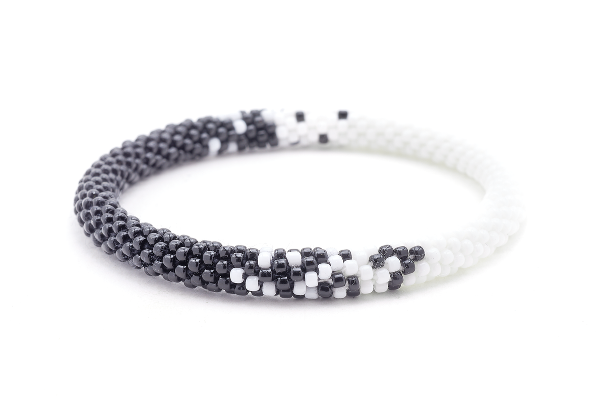 Sashka Co handmade beaded friendship bracelet with black and white glass beads. Crafted in Nepal by skilled artisans in a half-and-half blend pattern.