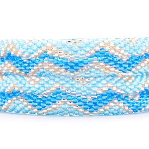 Sashka Co handmade beaded friendship bracelet with blue, light blue, and rose gold glass beads. Crafted in Nepal by skilled artisans.
