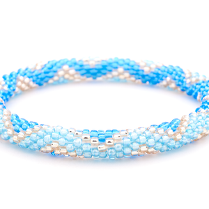 Sashka Co handmade beaded friendship bracelet with blue, light blue, and rose gold glass beads. Crafted in Nepal by skilled artisans.