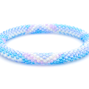 Sashka Co handmade beaded friendship bracelet with blue, purple, and clear zipper zigzag pattern. Crafted in Nepal by skilled artisans.