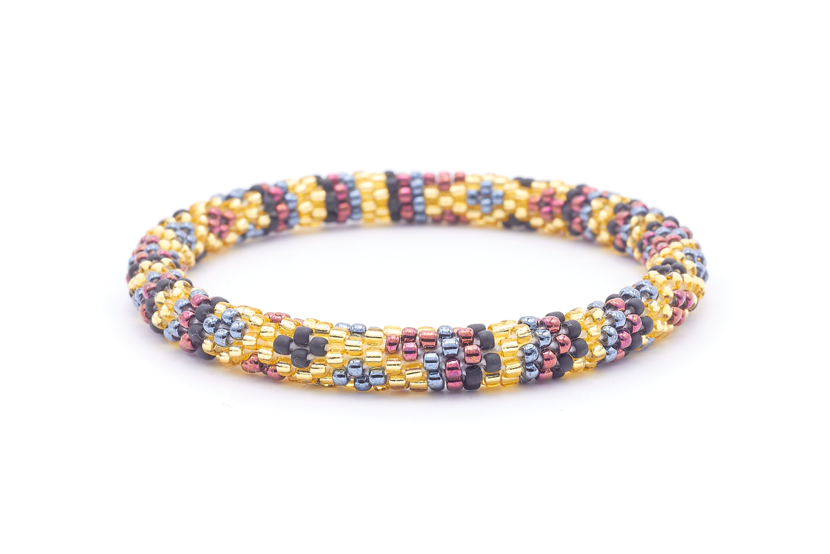 Sashka Co. handmade beaded friendship bracelet with champagne gold, matte black, silver, and iridescent maroon diamond line pattern. Crafted in Nepal by skilled artisans.