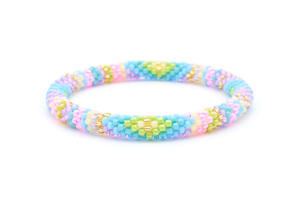 Sashka Co. handmade beaded friendship bracelet with champagne gold, matte yellow, green, turquoise, blue, purple, and pink diamond line pattern. Crafted in Nepal by skilled artisans.