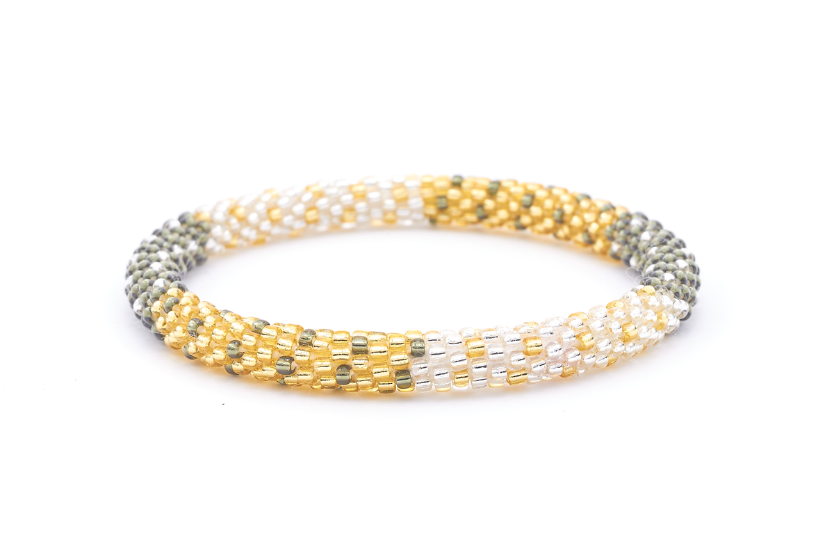 Sashka Co handmade beaded friendship bracelet with champagne gold, silver, and clear glass beads. Crafted in Nepal by skilled artisans in a block polka dot pattern.