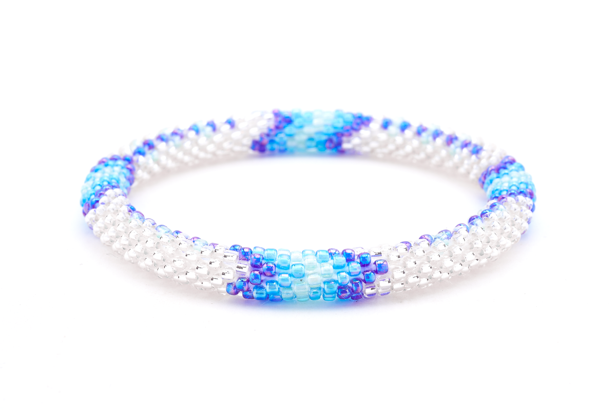 Sashka Co handmade beaded friendship bracelet with clear, iridescent blue, blue, and light blue glass beads. Crafted in Nepal by skilled artisans.
