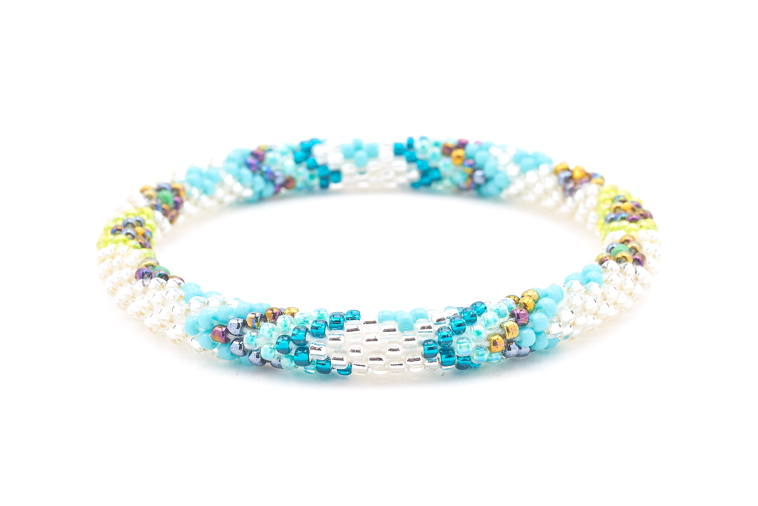 Sashka Co handmade beaded friendship bracelet with clear, turquoise, teal, iridescent green, aqua, and iridescent glass beads. Crafted in Nepal by skilled artisans in a chevron diamond pattern.