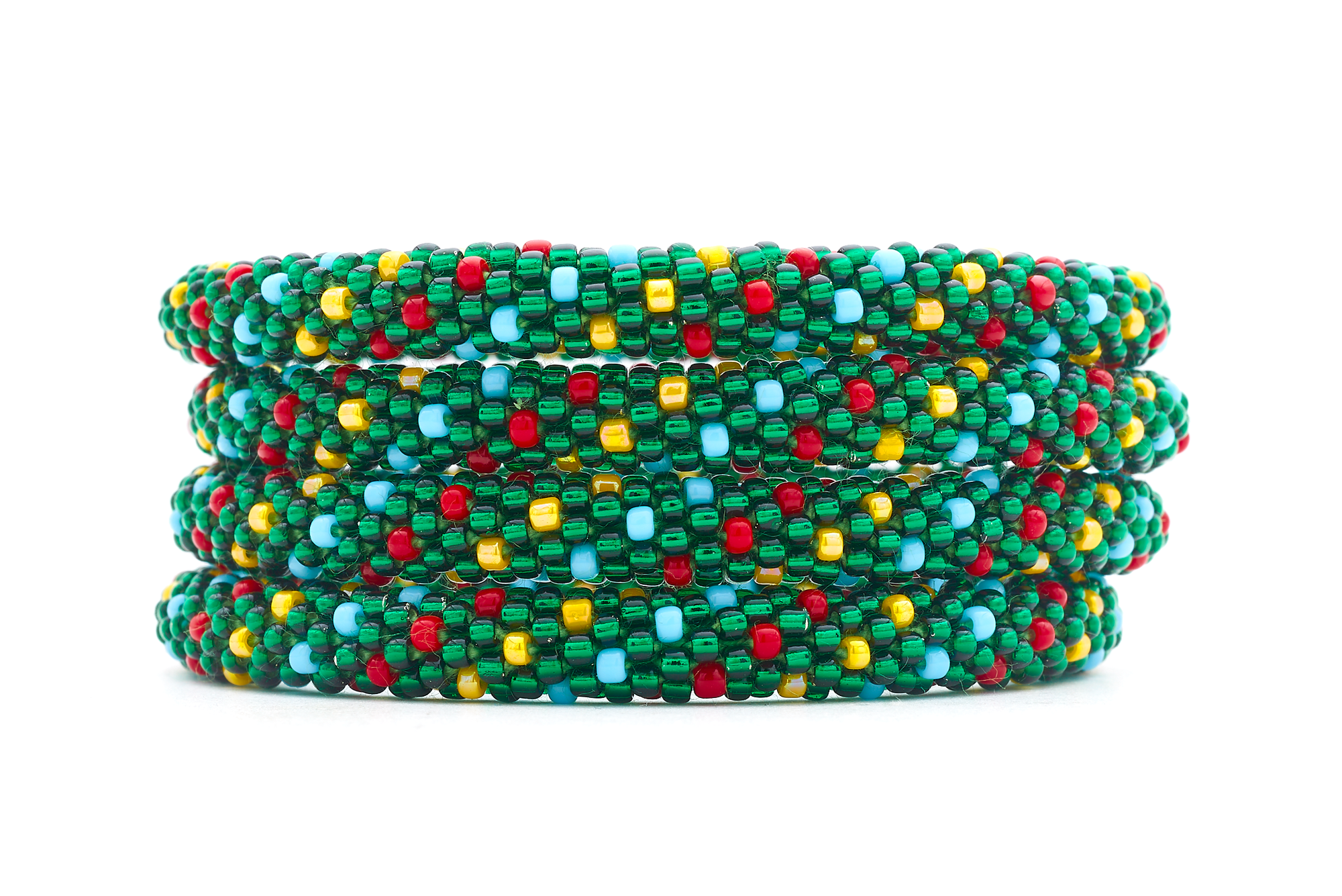 Sashka Co handmade beaded friendship bracelet with green, red, yellow, and blue glass beads. Crafted in Nepal by skilled artisans in a spiral polka dot pattern.
