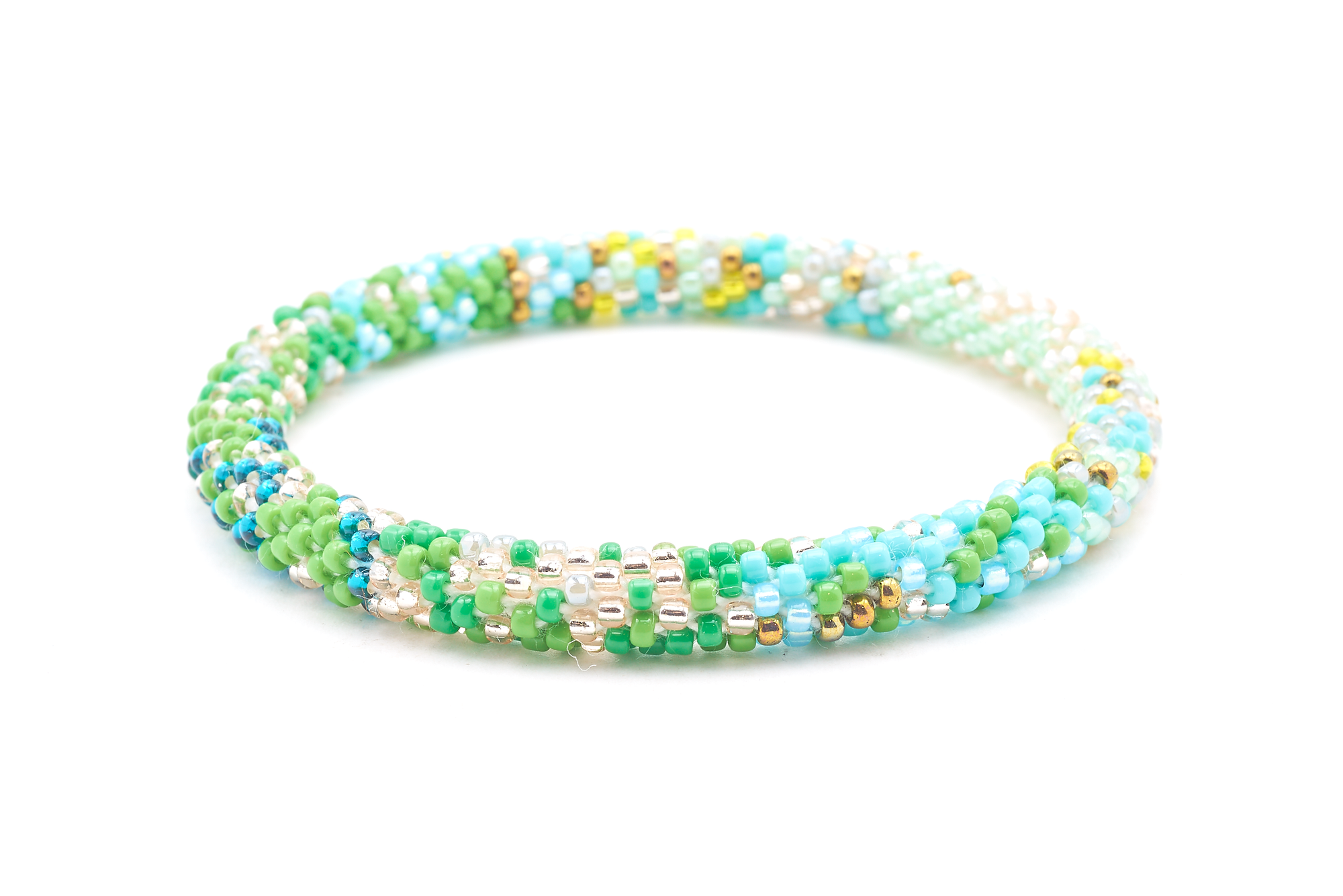 Sashka Co handmade beaded friendship bracelet with green, teal, rose gold, clear, turquoise, yellow, mint, and bronze glass beads. Crafted in Nepal by skilled artisans in a confetti mixed pattern.

