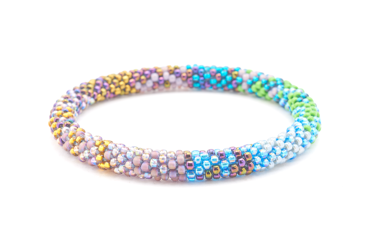 Sashka Co handmade beaded friendship bracelet with iridescent blue, green, teal, iridescent purple, mauve, gold, and gray glass beads. Crafted in Nepal by skilled artisans in a confetti pattern.