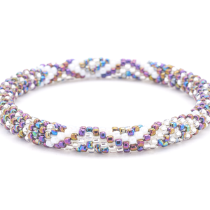 Sashka Co handmade beaded friendship bracelet with iridescent, purple, clear, and white glass beads. Crafted in Nepal by skilled artisans in a diamond line pattern.