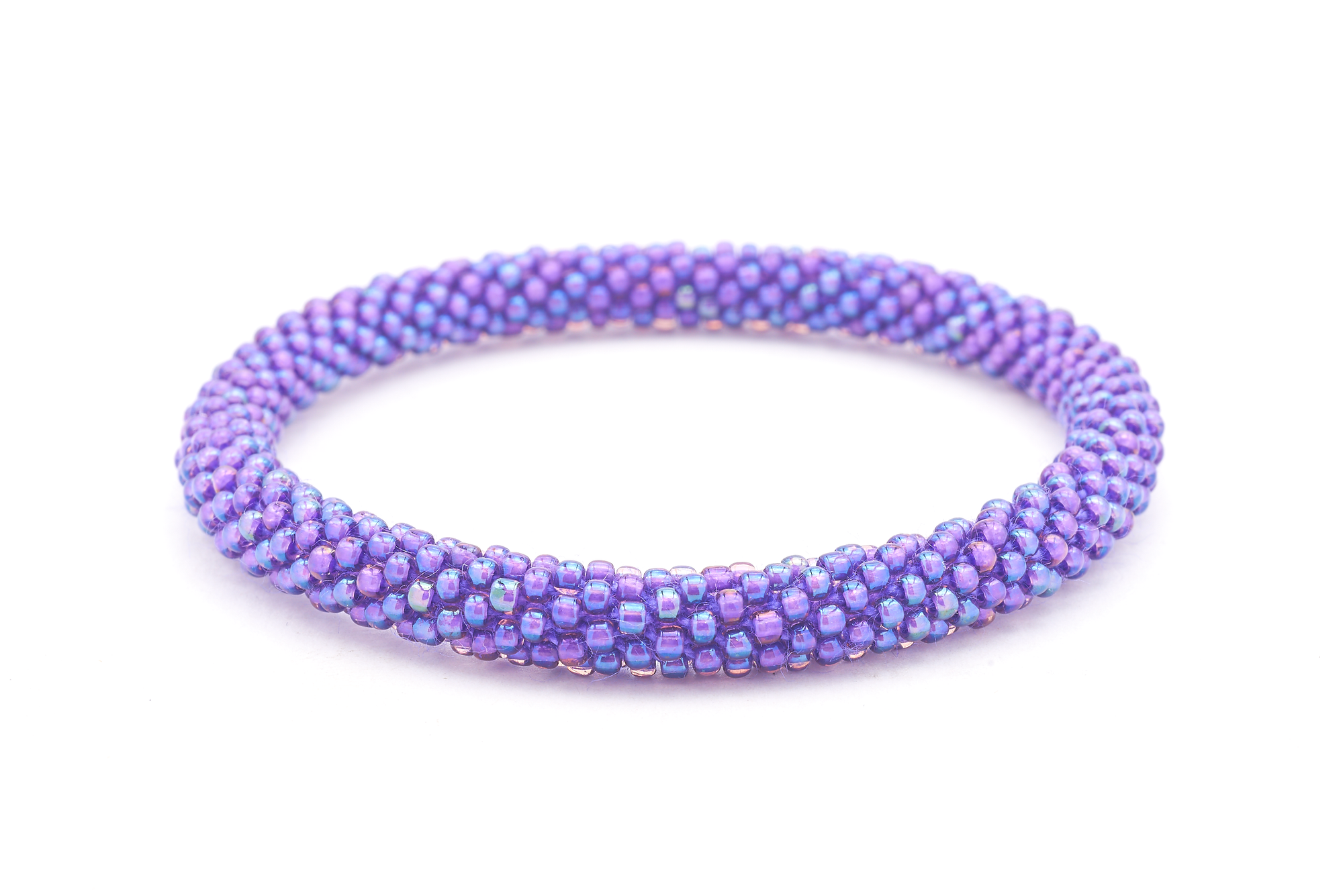 Sashka Co handmade beaded friendship bracelet with solid iridescent purple glass beads. Crafted in Nepal by skilled artisans.