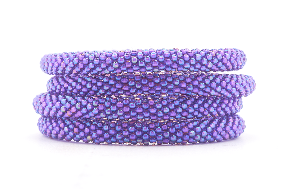 Sashka Co handmade beaded friendship bracelet with solid iridescent purple glass beads. Crafted in Nepal by skilled artisans.