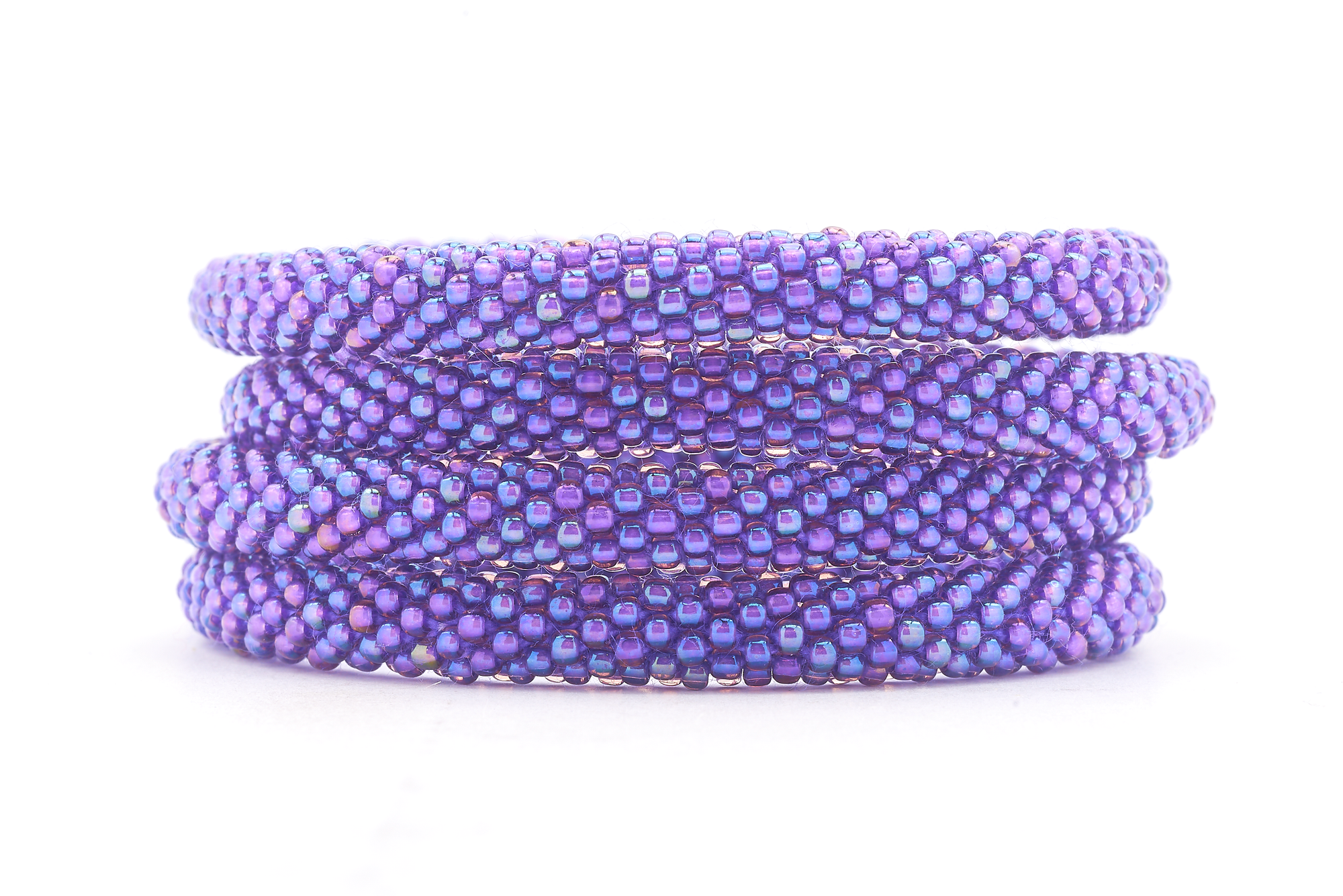Sashka Co handmade beaded friendship bracelet with solid iridescent purple glass beads. Crafted in Nepal by skilled artisans.