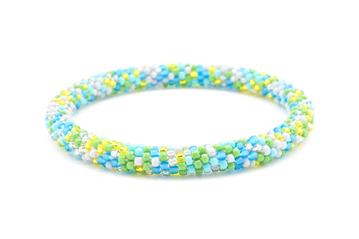 Sashka Co handmade beaded friendship bracelet with matte blue, turquoise, gray, yellow, and iridescent gray glass beads. Crafted in Nepal by skilled artisans in a confetti pattern.