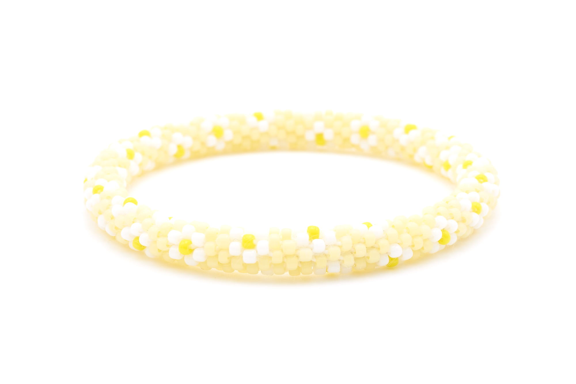Sashka Co. handmade beaded friendship bracelet with a floral pattern in matte light yellow, white, and yellow. Artisan-crafted in Nepal.