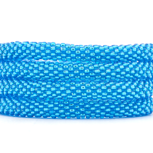 Sashka Co handmade beaded friendship bracelet with metallic blue glass beads. Crafted in Nepal by skilled artisans.