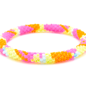 Sashka Co handmade beaded friendship bracelet with orange, matte pink, yellow, and blue glass beads. Crafted in Nepal by skilled artisans.