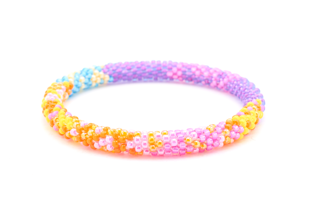 Sashka Co handmade beaded friendship bracelet with orange, yellow, pink, purple, and blue glass beads. Crafted in Nepal by skilled artisans in a confetti mixed pattern.